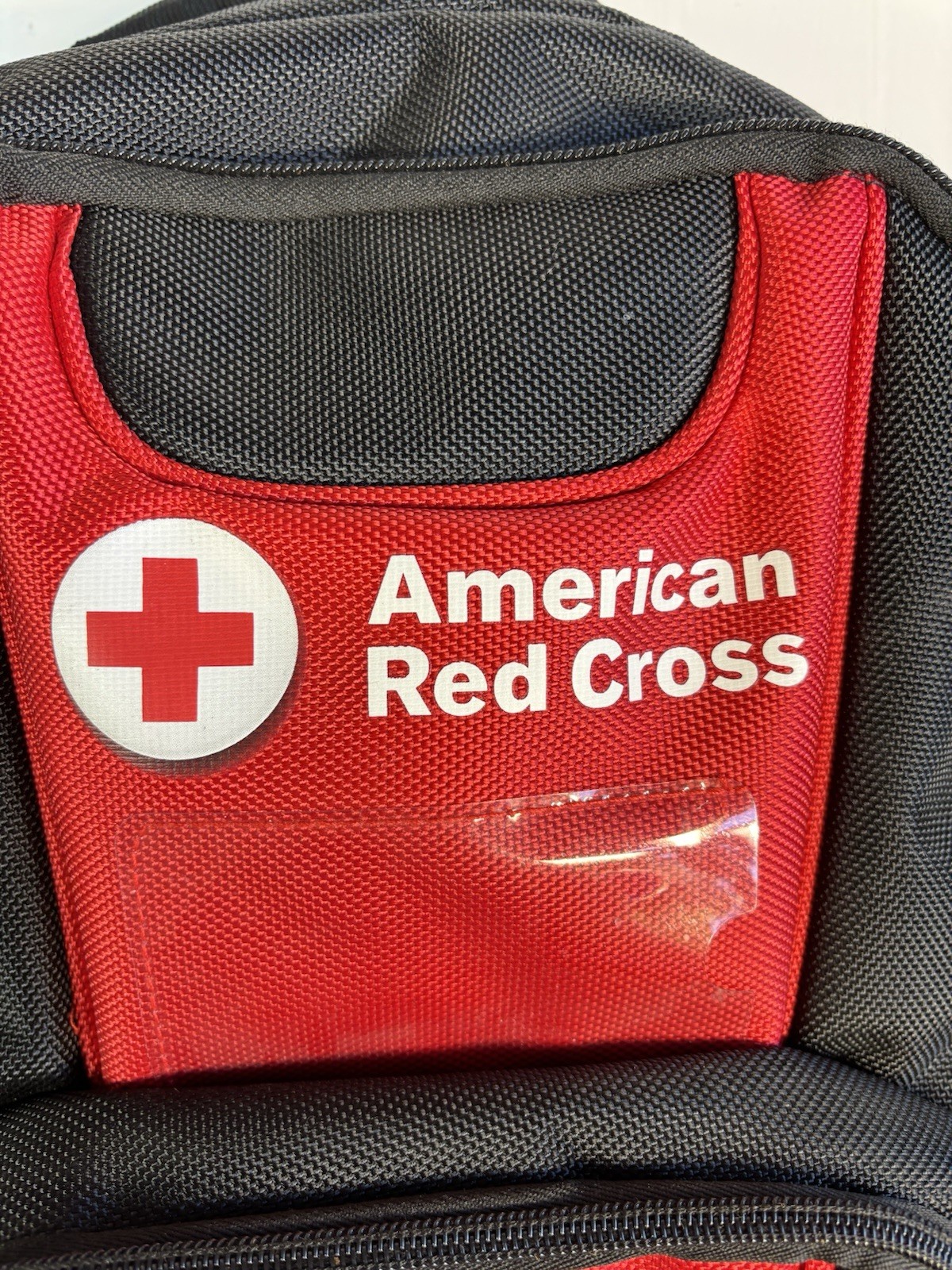 American Red Cross instructors backpack