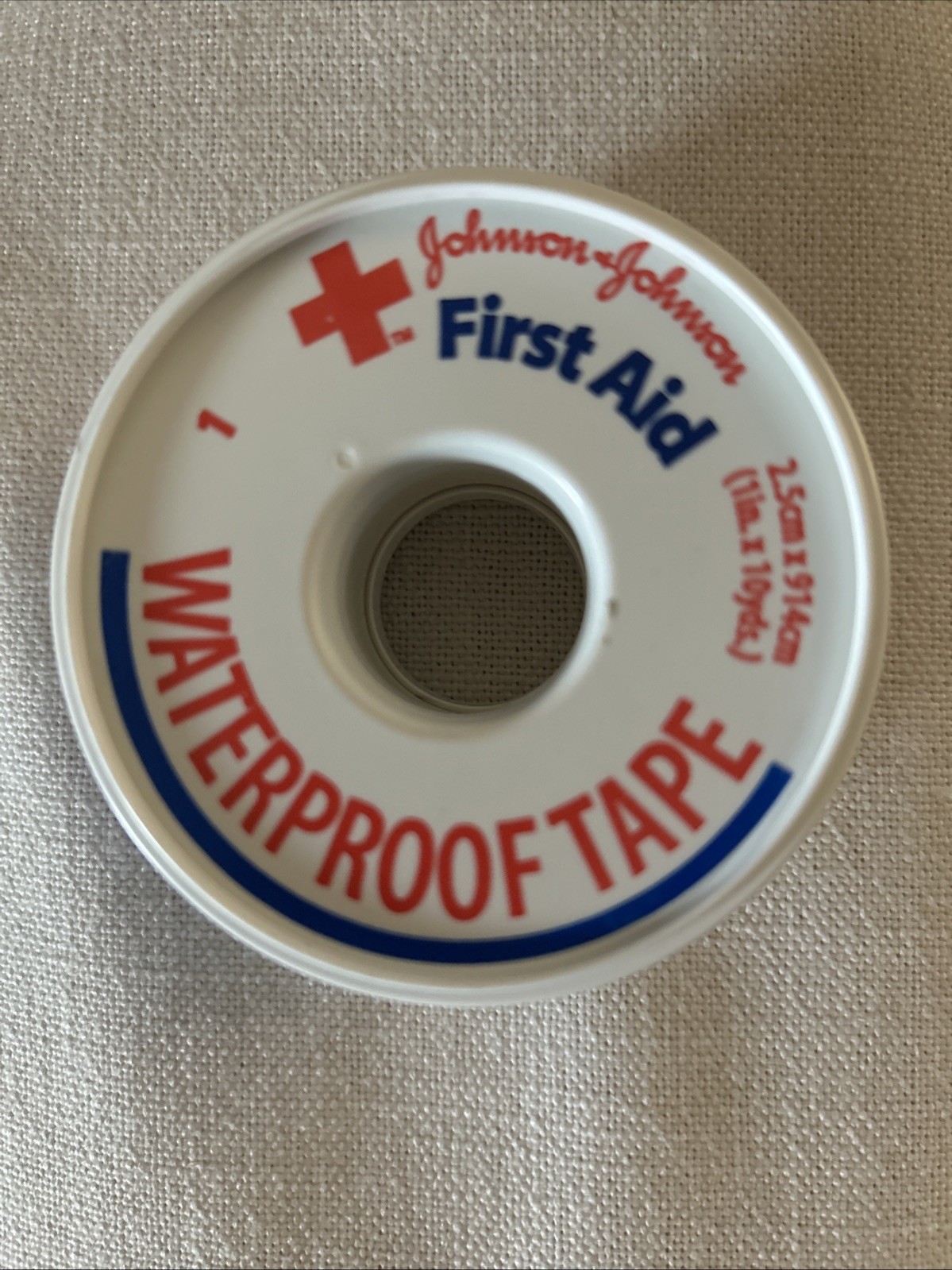 Johnson and Johnson First Aid Waterproof Adhesive.