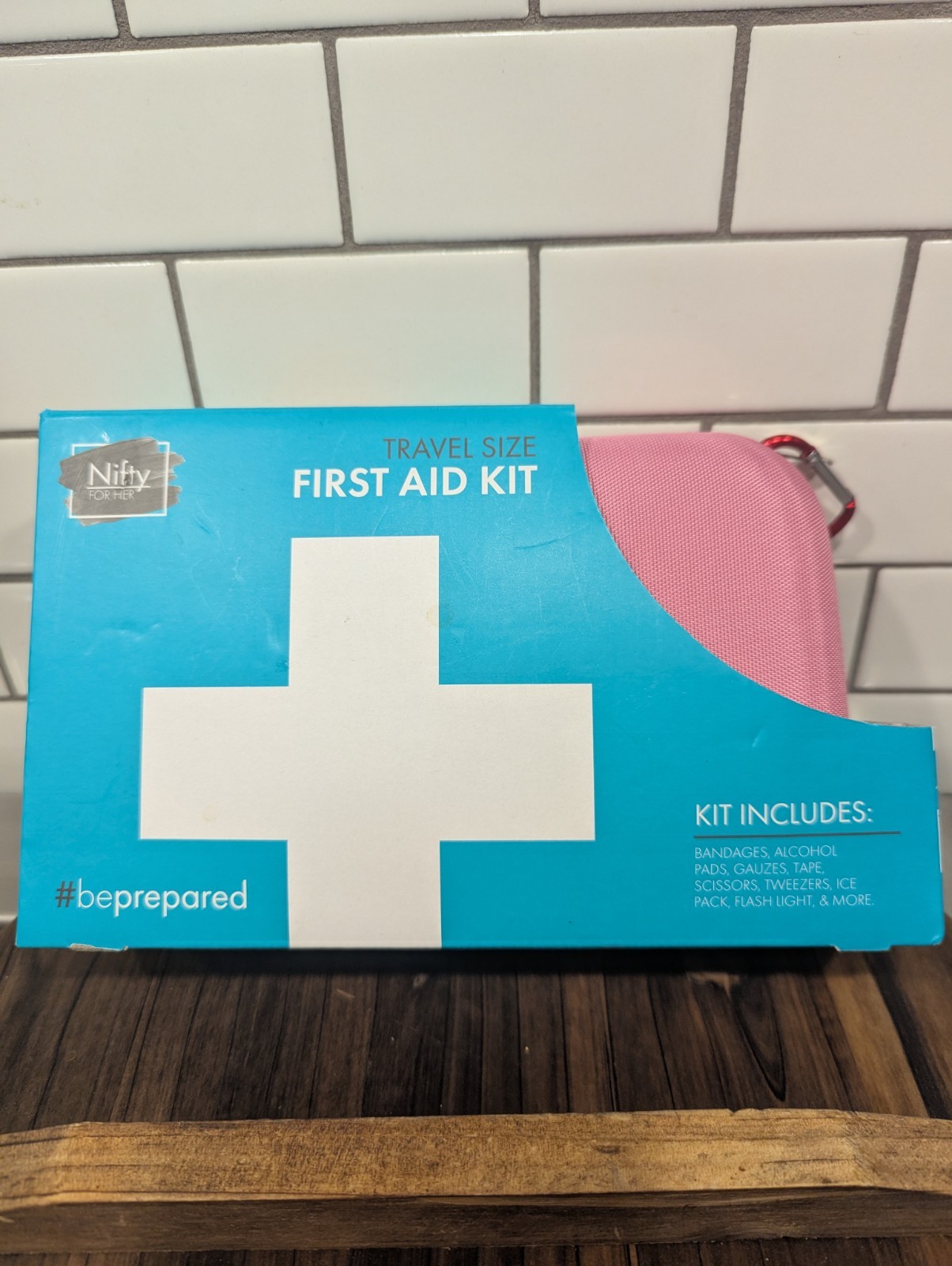 Nifty Pink First Aid Kit with Essential Emergency Medical Supplies. Travel Size.