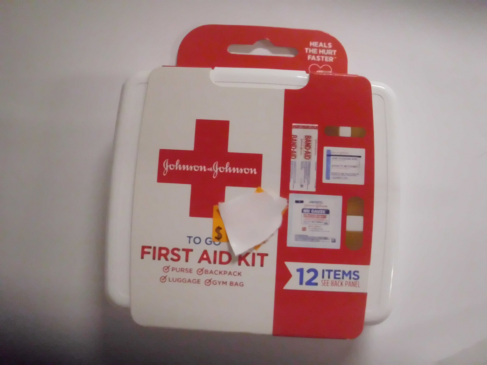Johnson & Johnson First Aid To Go! Portable Mini Travel Kit, 12 pieces pack of 1