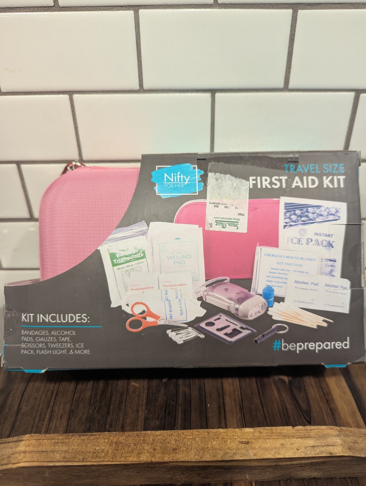 Nifty Pink First Aid Kit with Essential Emergency Medical Supplies. Travel Size.