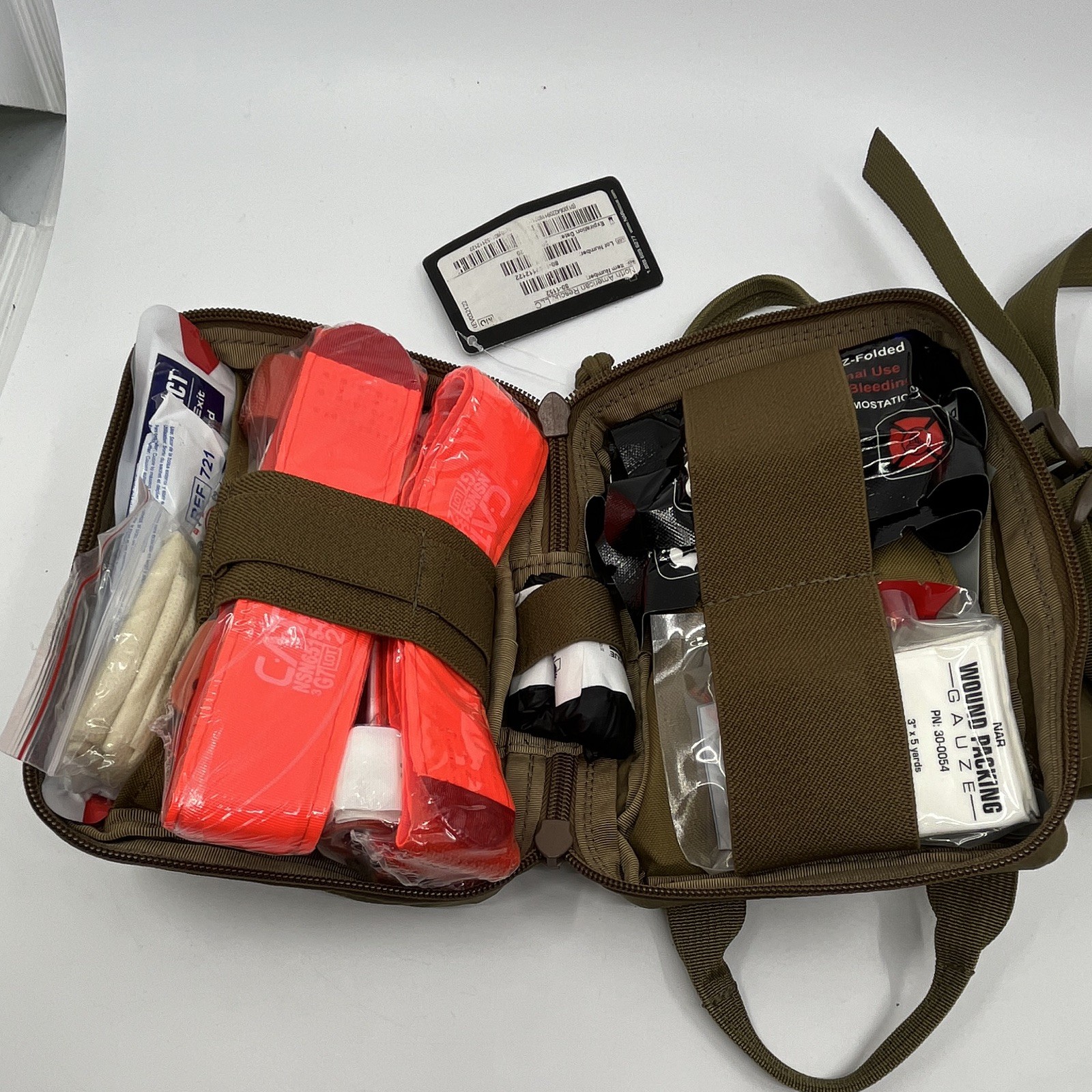 North American Rescue Vision First Aid Set Black Tourniquet Dressing Exp 2030