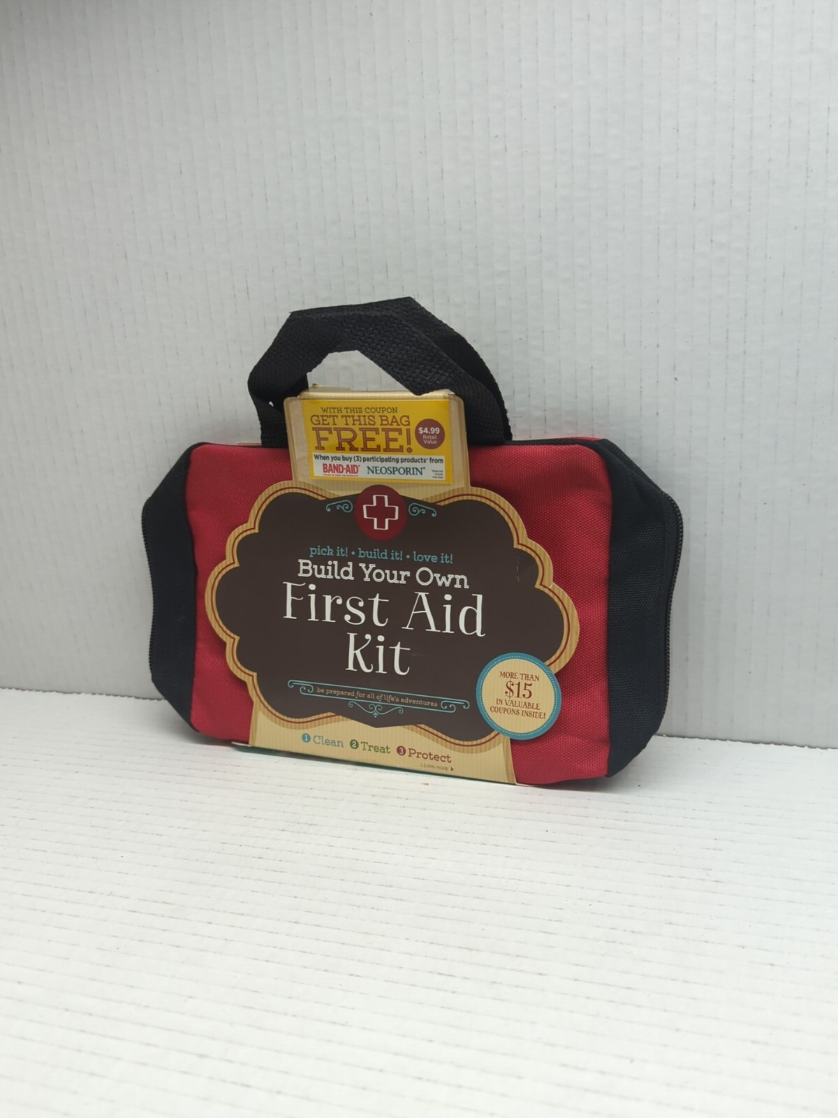JOHNSON & JOHNSON BUILD YOUR OWN FIRST AID KIT BAG RED W/ BLACK AND GREY BDU