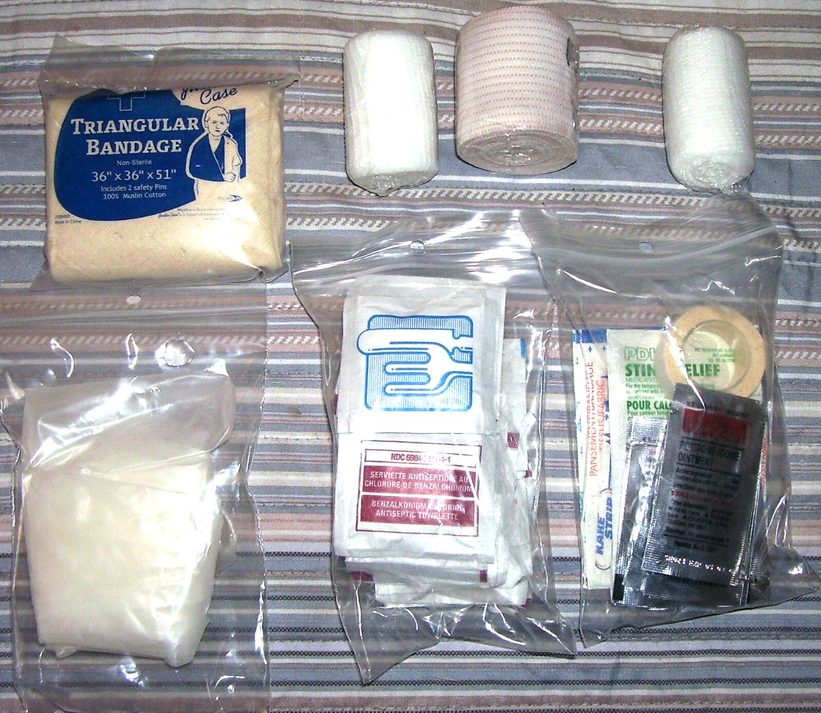 FIRST AID KIT FOR USE AT HOME; WORK; SCHOO; AUTOMOBILE / HARD ZIPPERED CASE