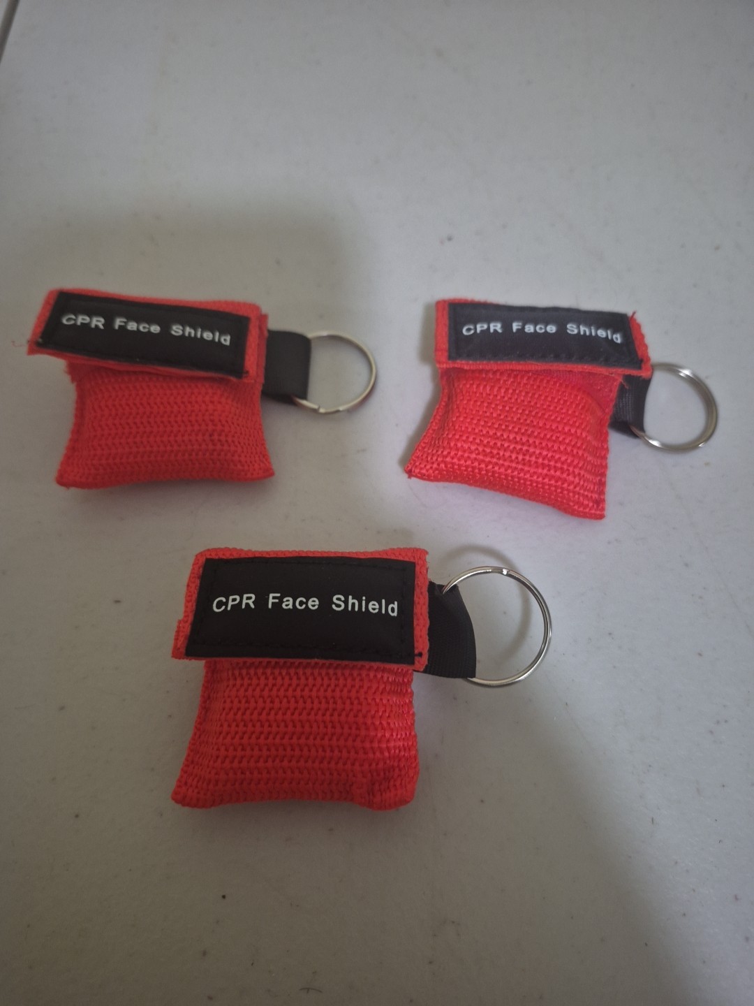 3 Red CPR Face Shield Pocket Mask with Keychain imprinted CPR 30:2