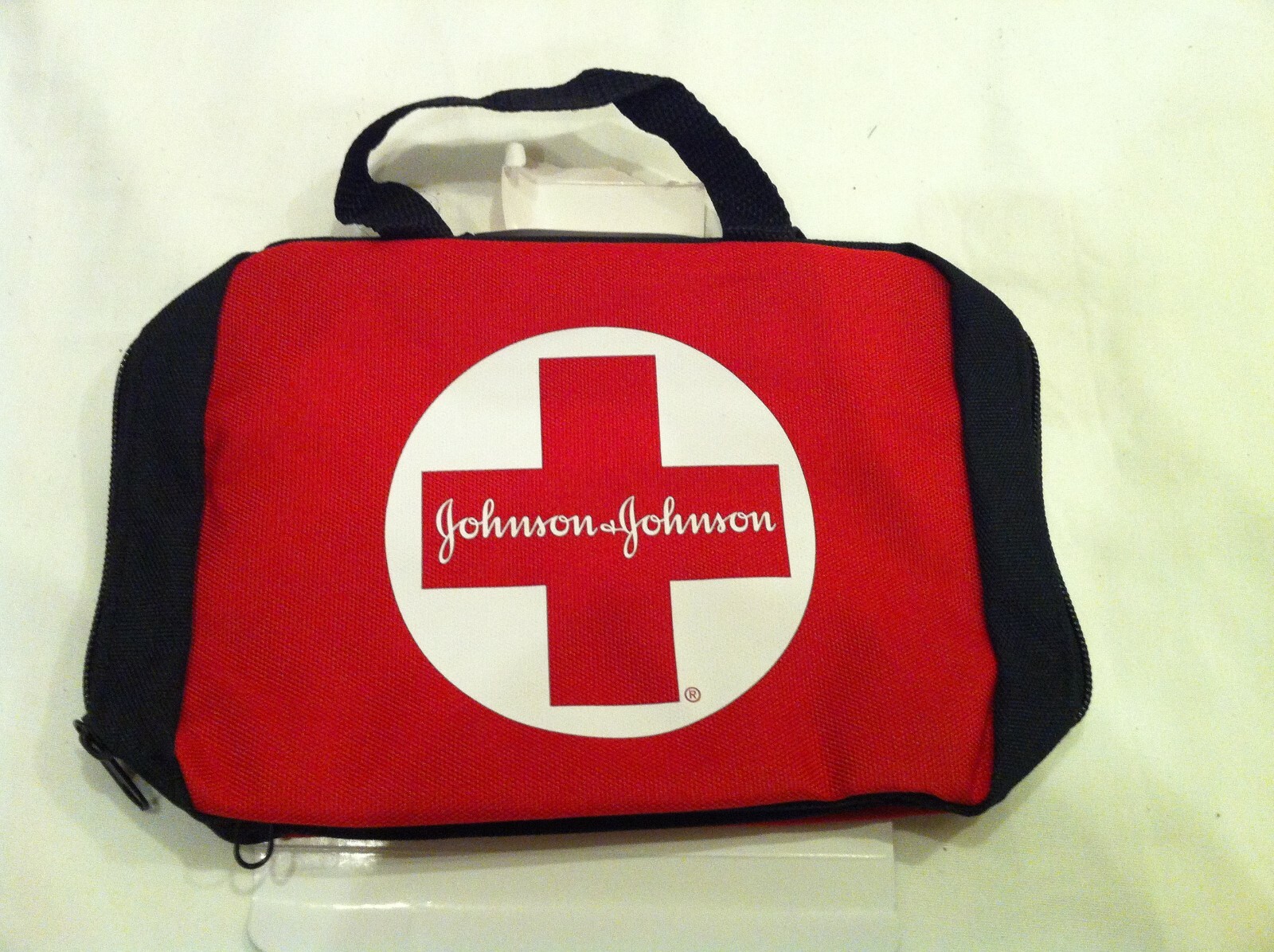 JOHNSON & JOHNSON BUILD YOUR OWN FIRST AID KIT BAG RED W/ BLACK SIDES
